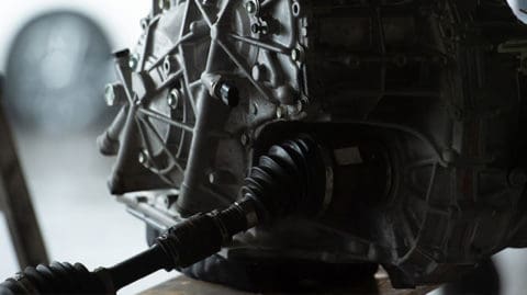 Mechanic replacing recalled engine